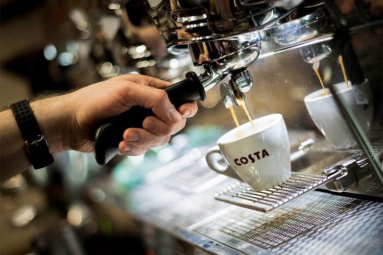 Close up of a Costa coffee being made