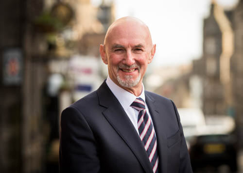 Business headshot of a man in a suit in Edinburgh